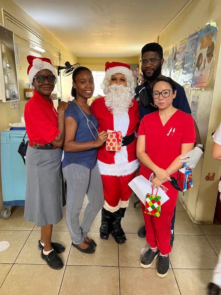 A Christmas group photo with Santa
